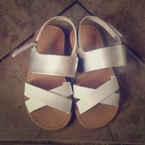 White and silver sandals.
